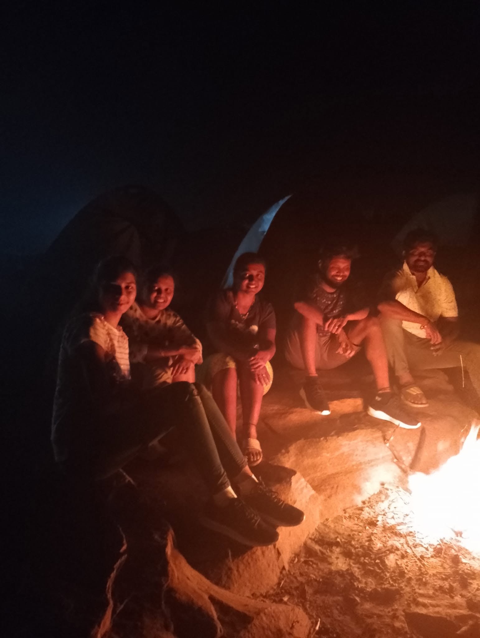 Outdoor campfire experience with friends and family